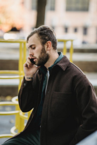 A man engaged in a phone conversation