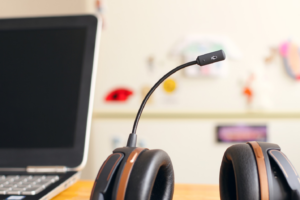 A mic and laptop on table 